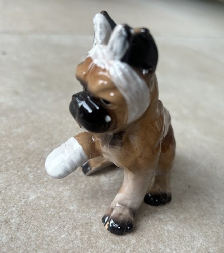 Boxer dog figurine crying - figurine.,