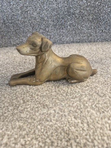 Vintage brass resting - resting, dog